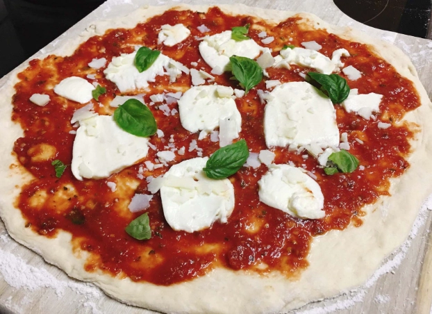 What is authentic Italian pizza dough made of?